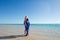 Relaxed woman Australian flag at beach