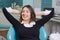 Relaxed woman with braces in dentist chair