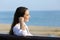 Relaxed woman contemplating outdoor on the beach