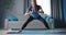 Relaxed woman stretching legs at home