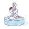 Relaxed woman in towel and bathrobe drinks tea after bath, relaxing massage or sauna in spa salon