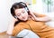 Relaxed young woman listening music