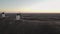 Relaxing aerial view of four windmills at sunset