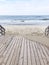 Relaxing and Calm Baltic Landscape Light Sandy beach,Cold Sea and wooden path.