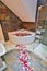 A relaxing candlelit bath with rose petals and a a rubber duck. Low lighting since bathroom was only lit with candles to create