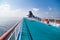 Relaxing cruise ship deck against blue sky and ocean