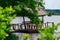 Relaxing gazebo built on the river against the forest