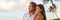 Relaxing multiracial couple watching sunset on beach vacation banner. Portrait of Asian woman, Caucasian man together