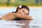 Relaxing pool woman on holidays - vacation travel