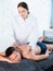 Relaxing professional massage for young man in spa salon