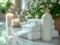 Relaxing spa setting with a white bottle, fluffy towels, candles, and flowers on a marble countertop. Copy space