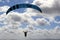 Relaxing view of stunning clouds and man paragliding, California, 2016