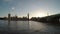 Relaxing view of Thames waves river and Big Ben Parliament building and at sunset -