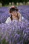 Relaxing woman in lavender field