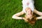 Relaxing woman laying on grass