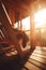 Relaxing on a Wooden Terrace: Person in Lounge Chair at Spa