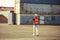 Relaxing young man with arms wide open after working, Happy engineer / foreman in hardhat and safety vest