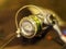 Reliable and high-quality silver fishing reel closeup
