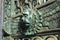 Relief with lion on ornate bronze gate at Hohenzollern Castle entrance, Germany