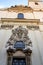 Relief sculpture on facade of the Church of Saint James The Greater with Minorite monastery in Old Town of Prague, Czech Republic