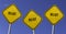 relief - three yellow signs with blue sky background