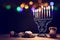 Religion image of jewish holiday Hanukkah background with menorah traditional candelabra, spinning top and doughnut