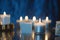 Religion image of jewish holiday Hanukkah with burning candles. AI generated