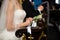 Religious bride and groom praying in church at wedding ceremony