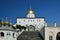 Religious building, Orthodox Christian cathedral with golden domes. Trinity Cathedral, Holy Dormition Pochayiv Lavra in Ukraine.