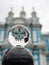 religious monument. Spherical lens (crystal ball) and Resurrection Smolny Cathedral. Saint-Petersburg