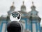 religious monument. Spherical lens (crystal ball) and Resurrection Smolny Cathedral. Saint-Petersburg