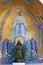 Religious mosaic and statue in Lourdes