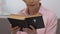Religious old lady reading Holy Bible, faith and belief, Christianity concept