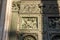 Religious statue on the bronze door of Saint Isaacâ€™s Cathedral or Isaakievskiy Sobor, a monuments of Russian architecture,near