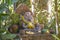 Religious stone sculpture of Ganesha god in garden, Thailand.