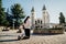 Religious woman praying to God and Virgin Mary in Medjugorje.Woman in emotional stress and pain.Christianity.Strong religion,faith