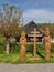 Religious wooden statues of Cyril and Methodius with the Double Slovak Cross.