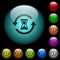 Reload symbol with sandglass icons in color illuminated glass buttons