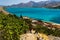 Remains of the ancient Venetian fortress of Spinalonga overlooking the calm, warm, clear waters of the Aegean Sea