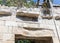 The remains of bas-relief of a lion on the ruins of a building in the Jewish Quarter of the old city of Safed