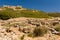 Remains of buildings and structures at the ancient Doric settlement of Itanos on the coast of Crete