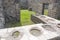 The remains of a counter where food was sold at the time of the devastating volcano eruption in Pompeii, Italy