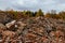 Remains of demolished old industrial building. Pile of stones, bricks and debris