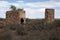 Remains of a derelict homestead in outback landscape