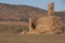 Remains of a derelict homestead in outback landscape