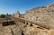 Remains of foundations of basilica in ancient city of Aspendos, Turkey