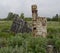 The remains of the furnace behind the ruins of the house in Russia
