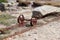 Remains after of granite mining on Ile Grande in Pleumeur-Bodou in Brittany - rails and rusty wheels