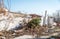 Remains of hurricane or earthquake aftermath disaster damage on ruined old houses with collapsed roof and wall