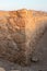 The remains  of internal buildings in the rays of the rising sun in the ruins of the fortress of Masada - is a fortress built by